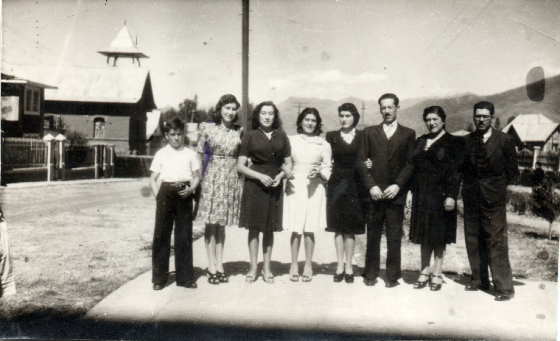 The eight Vidal Unda siblings in front of the village church