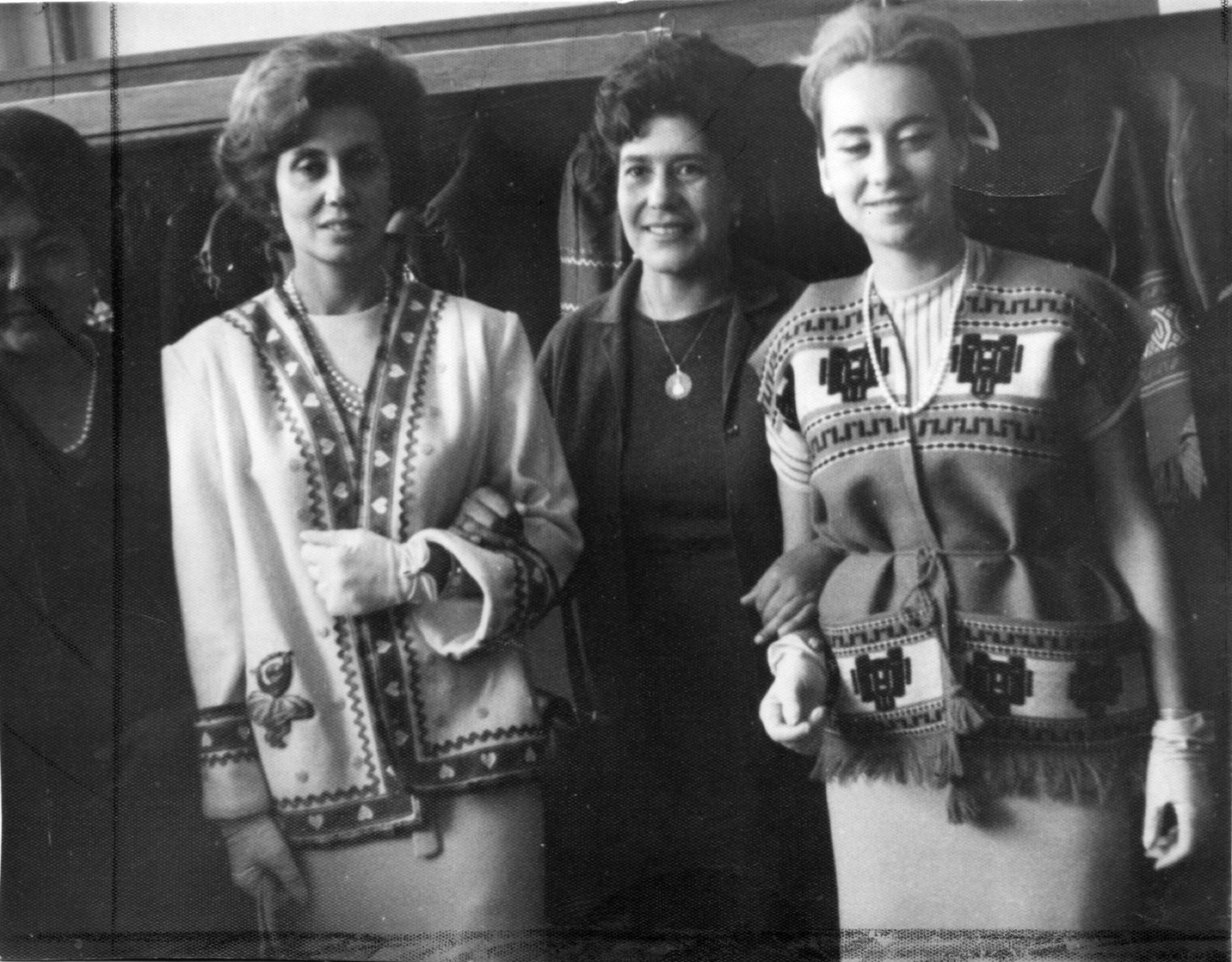 Two models in Cusco Line jackets beside Delia Vidal