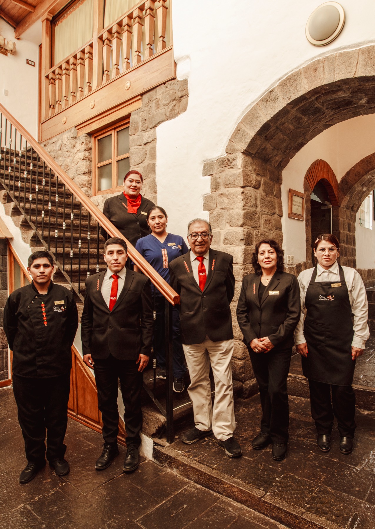 The Casa San Blas team at the foot of the stairs